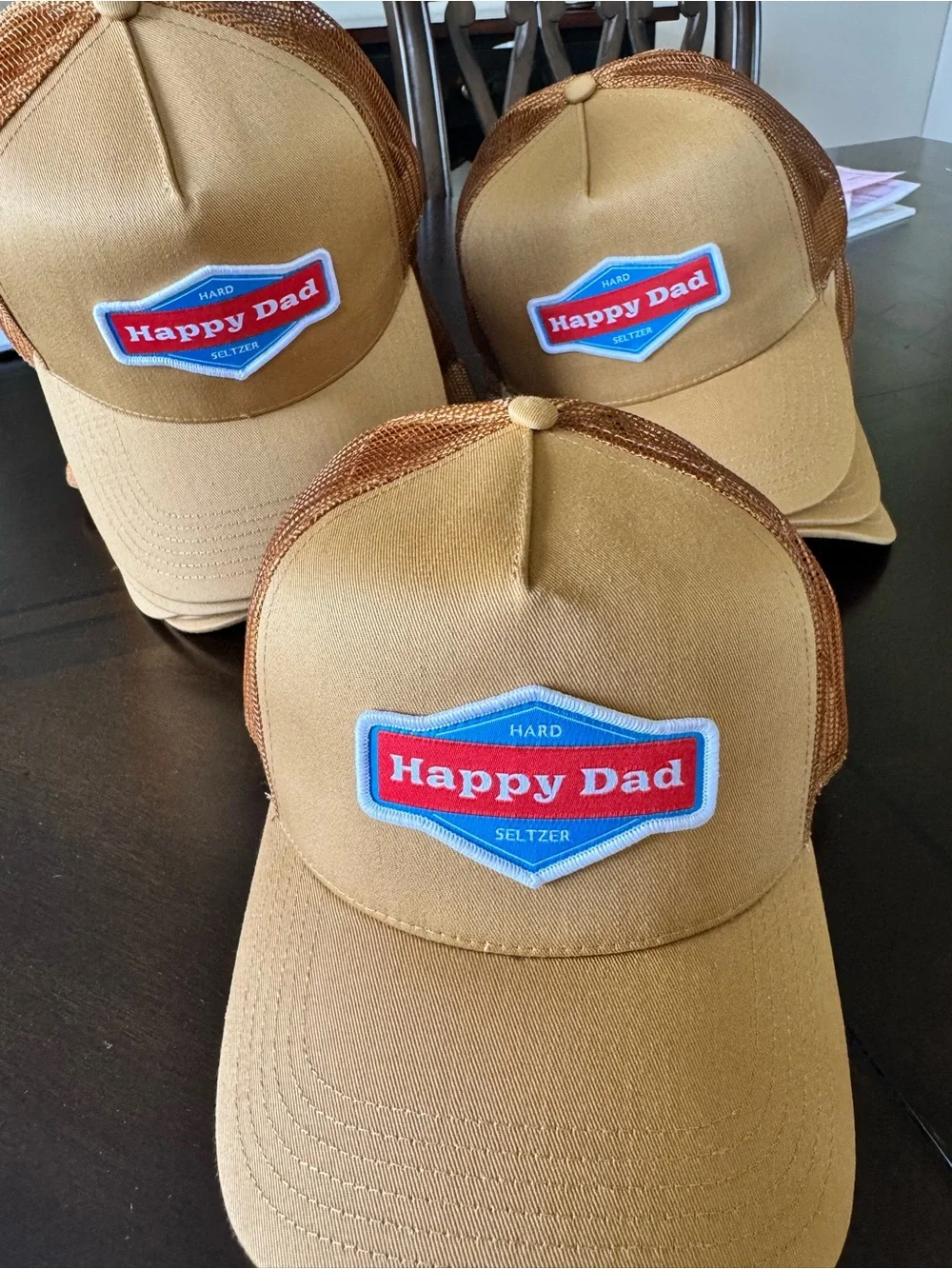®Happy Dad Hard Seltzer Tan/Gold Trucker Hat - Branded Mesh Cap
